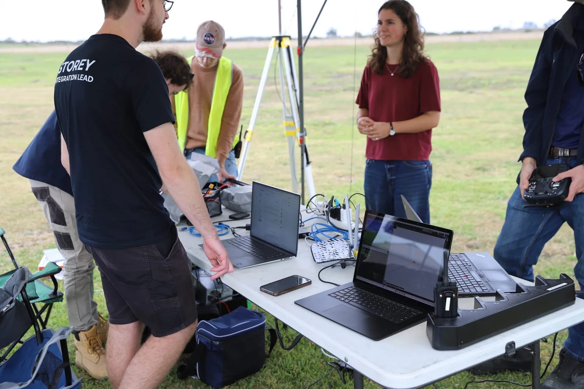 Flight Operations members working at a ground station in the field