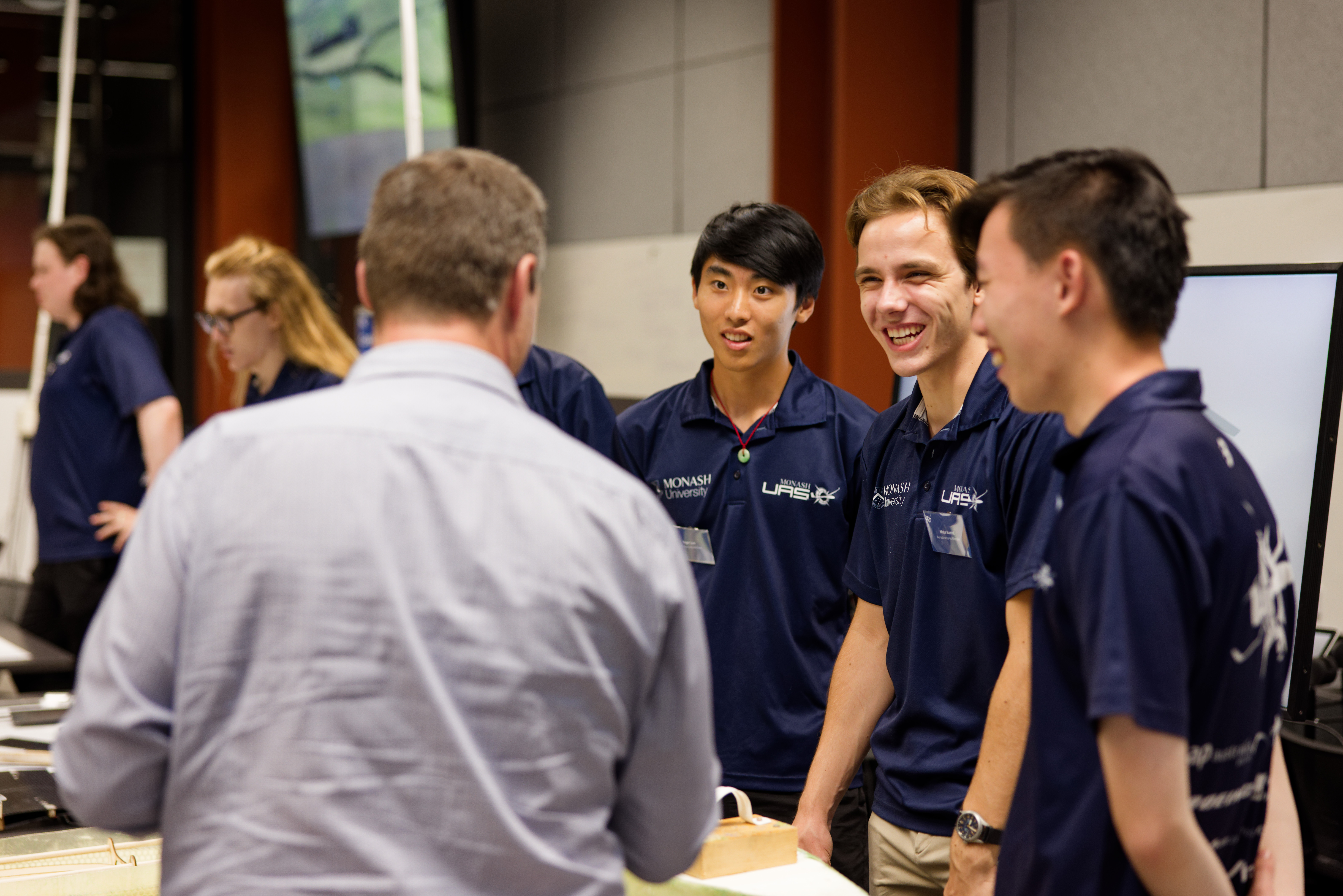 MUAS members discussing aircraft systems
