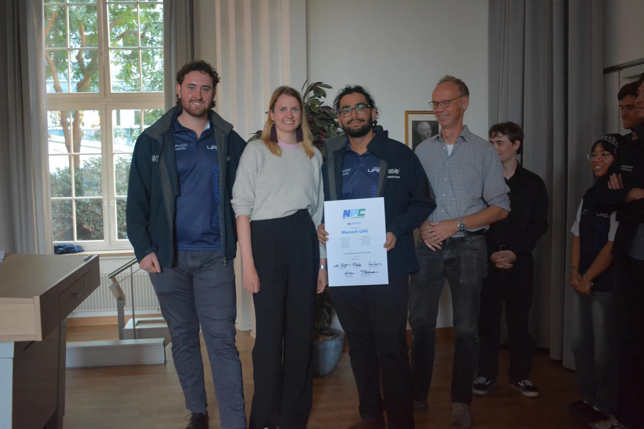 MUAS team celebrating at the NFC 2025 award ceremony in Hamburg